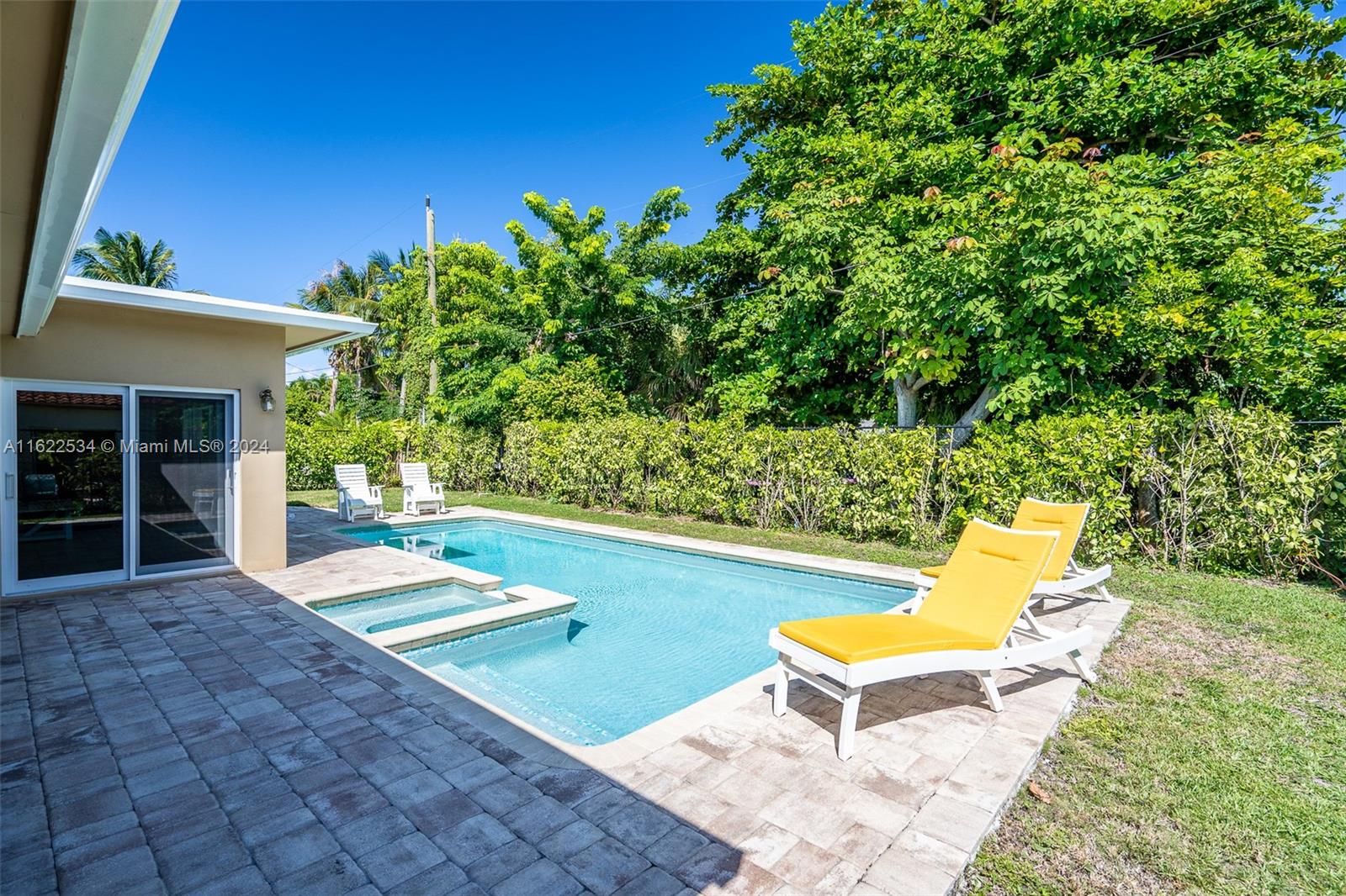 160 Northeast Wavecrest Court Boca Raton, FL 33432 - Photo 48 of 52 a view of swimming pool with seating space