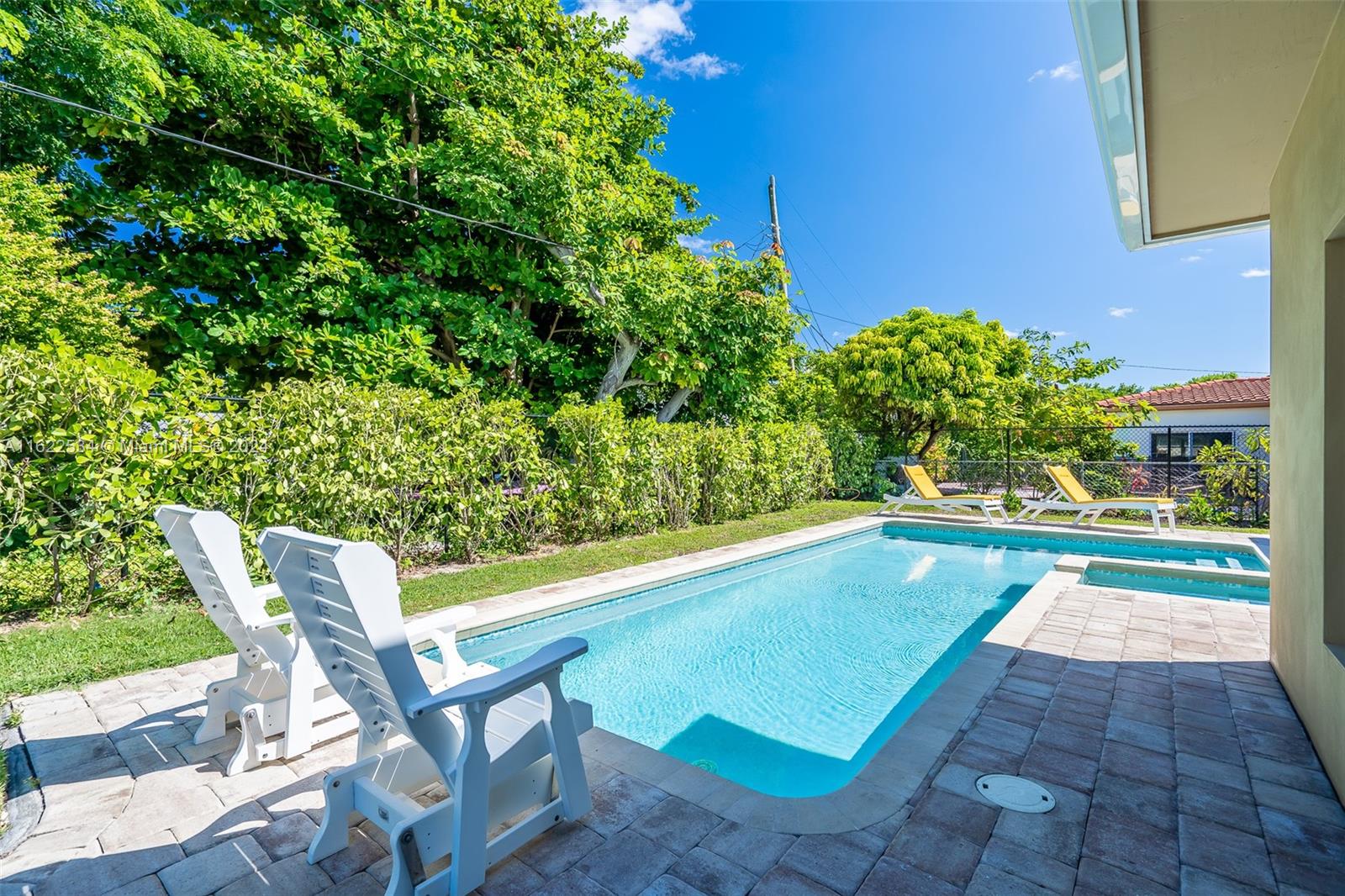 160 Northeast Wavecrest Court Boca Raton, FL 33432 - Photo 51 of 52 a view of a chairs and table in the patio