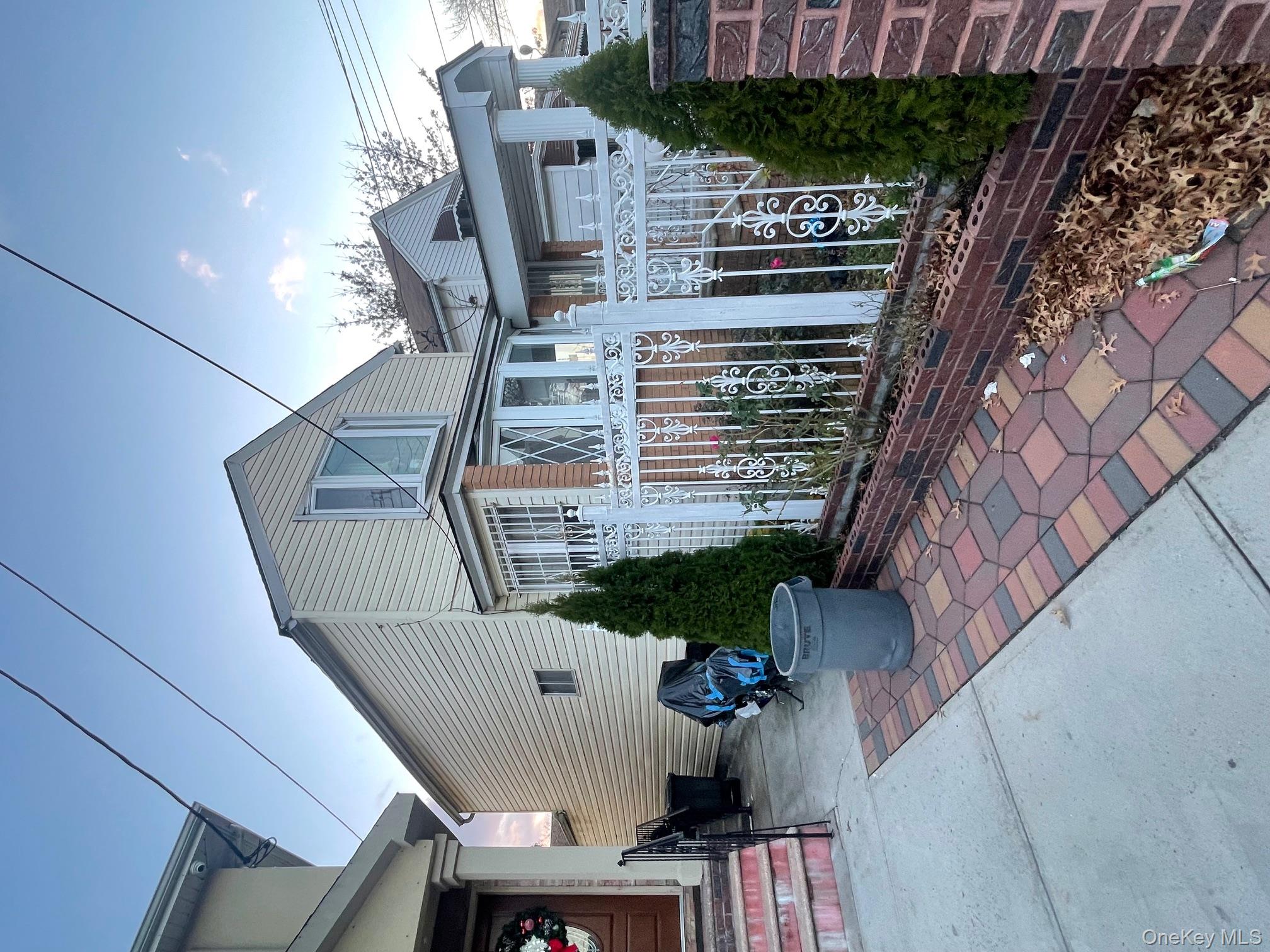 146-04 130th Avenue Queens, NY 11436 - Photo 3 of 7 a view of a house with yard and plants
