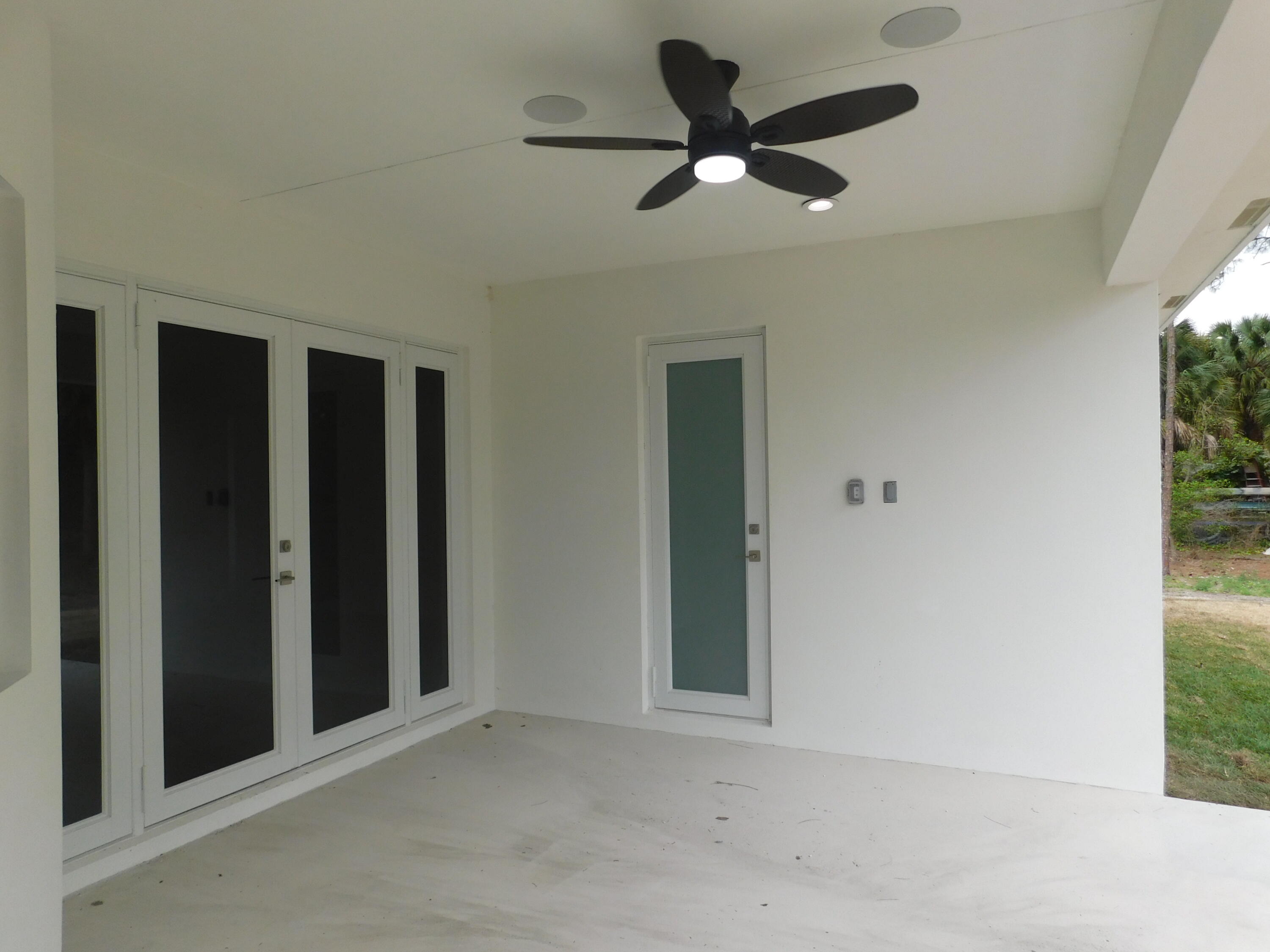 16147 63rd Road North Loxahatchee, FL 33470 - Photo 23 of 25 COVERED PATIO
