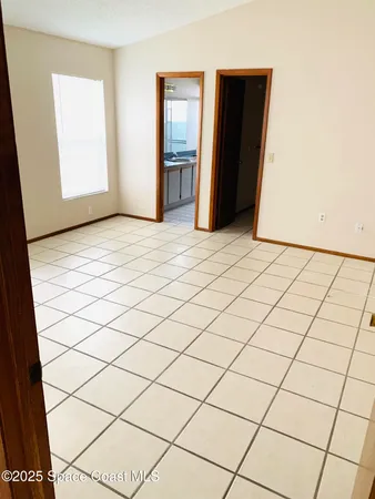 a view of a room & white wall