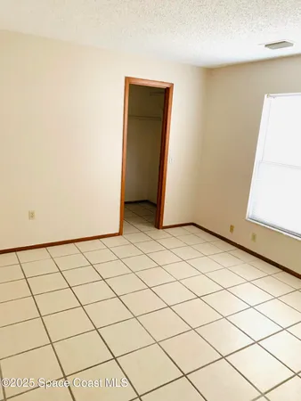 a view of a room and a window