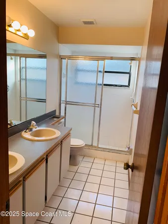 a bathroom with a toilet a sink and a bathtub