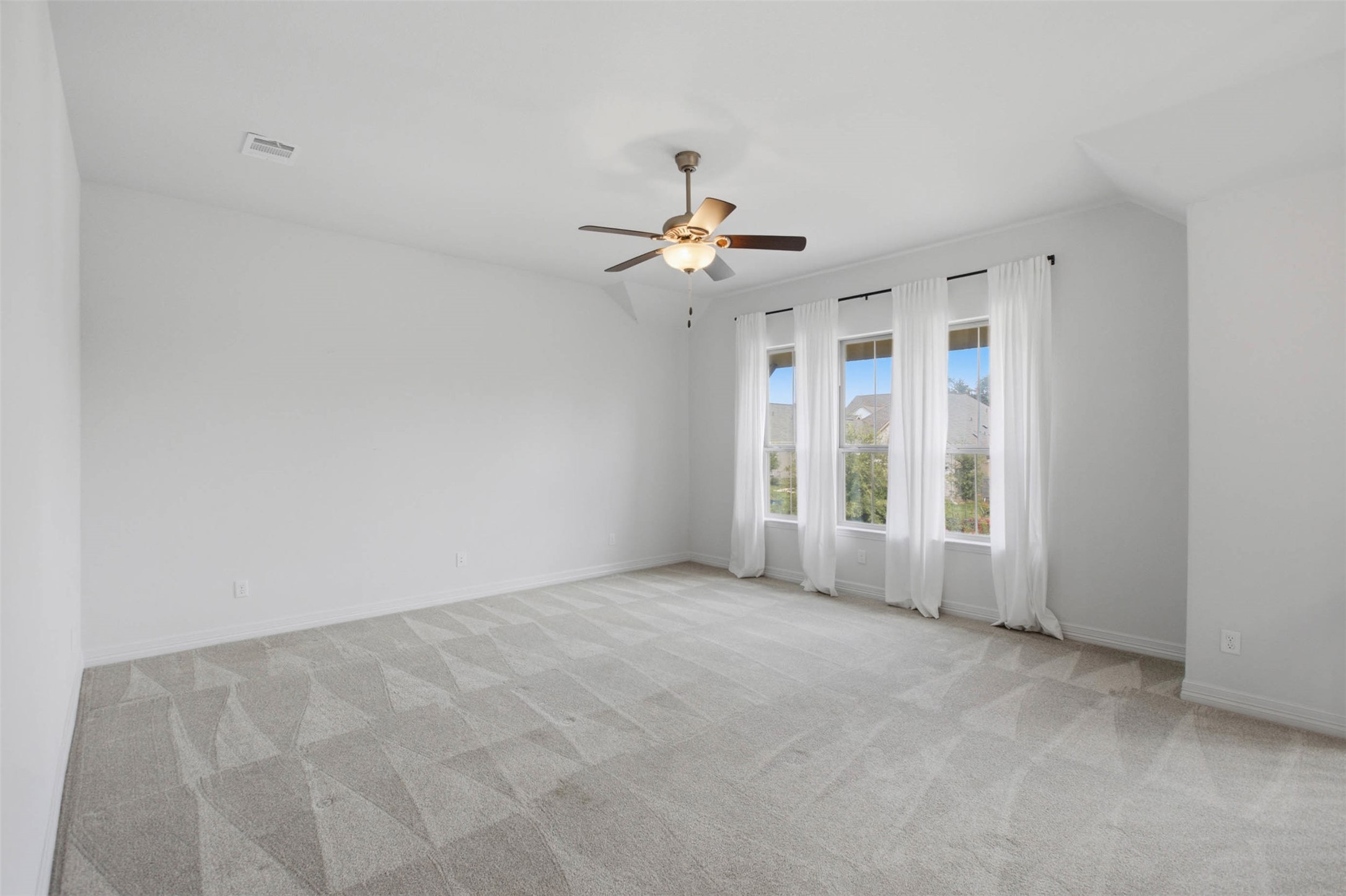 213 Diamondback Drive Georgetown, TX 78628 - Photo 17 of 37 Upstairs, two additional bedrooms and a spacious flex room provide versatility for a game room, media room, home office, or second living area.
