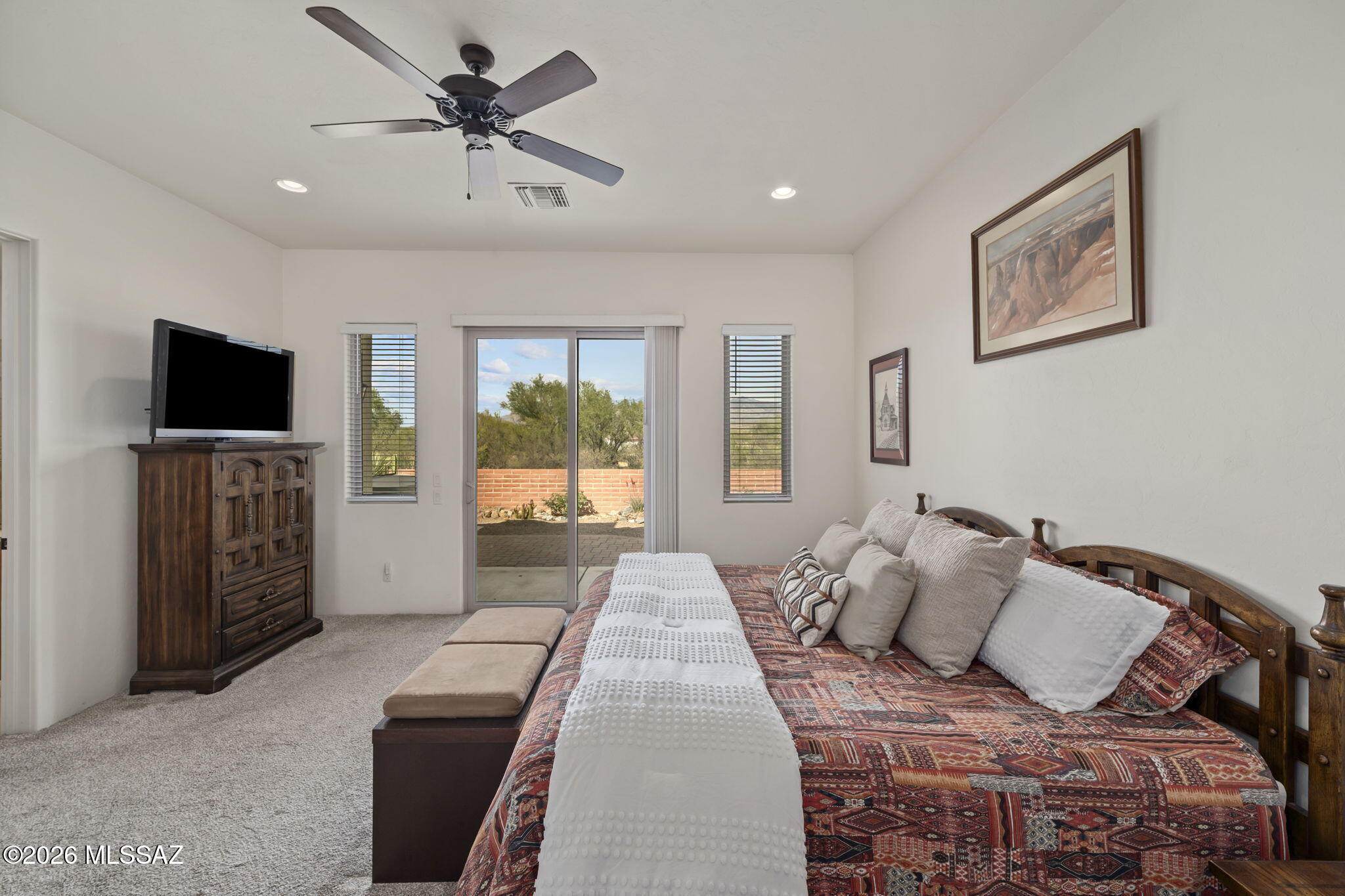 45 High View Court Tubac, AZ 85646 - Photo 22 of 44 a living room with furniture and a flat screen tv