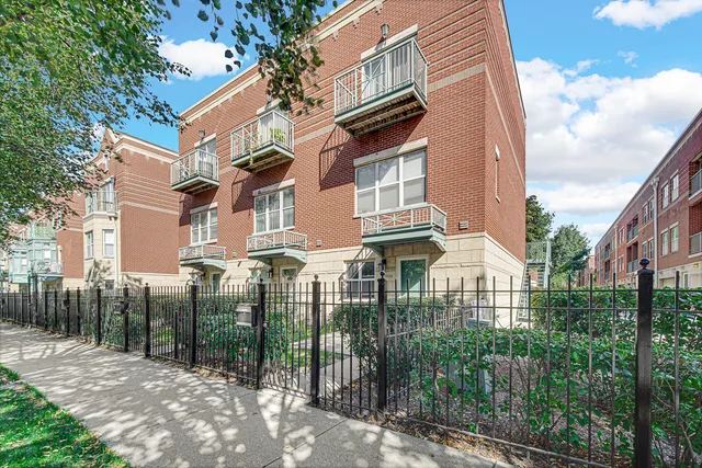 a view of a building with a street