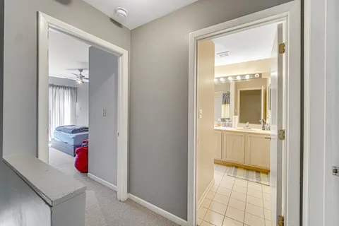a bathroom with a sink and mirror