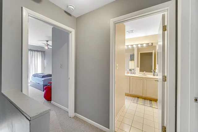 a bathroom with a sink and mirror