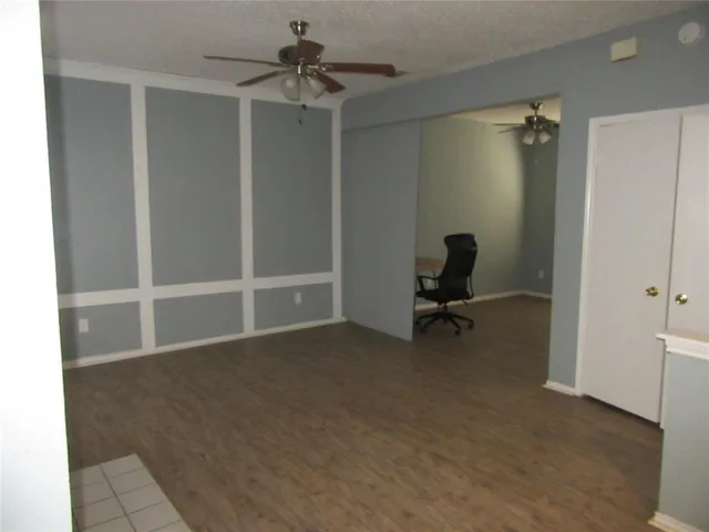 a view of room with air conditioner and closet