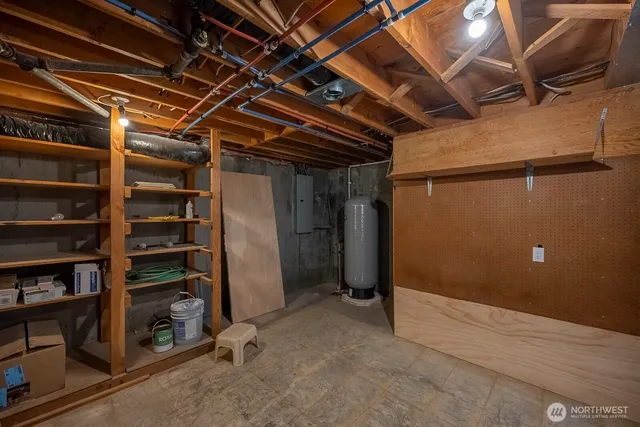 a view of an empty room with furniture