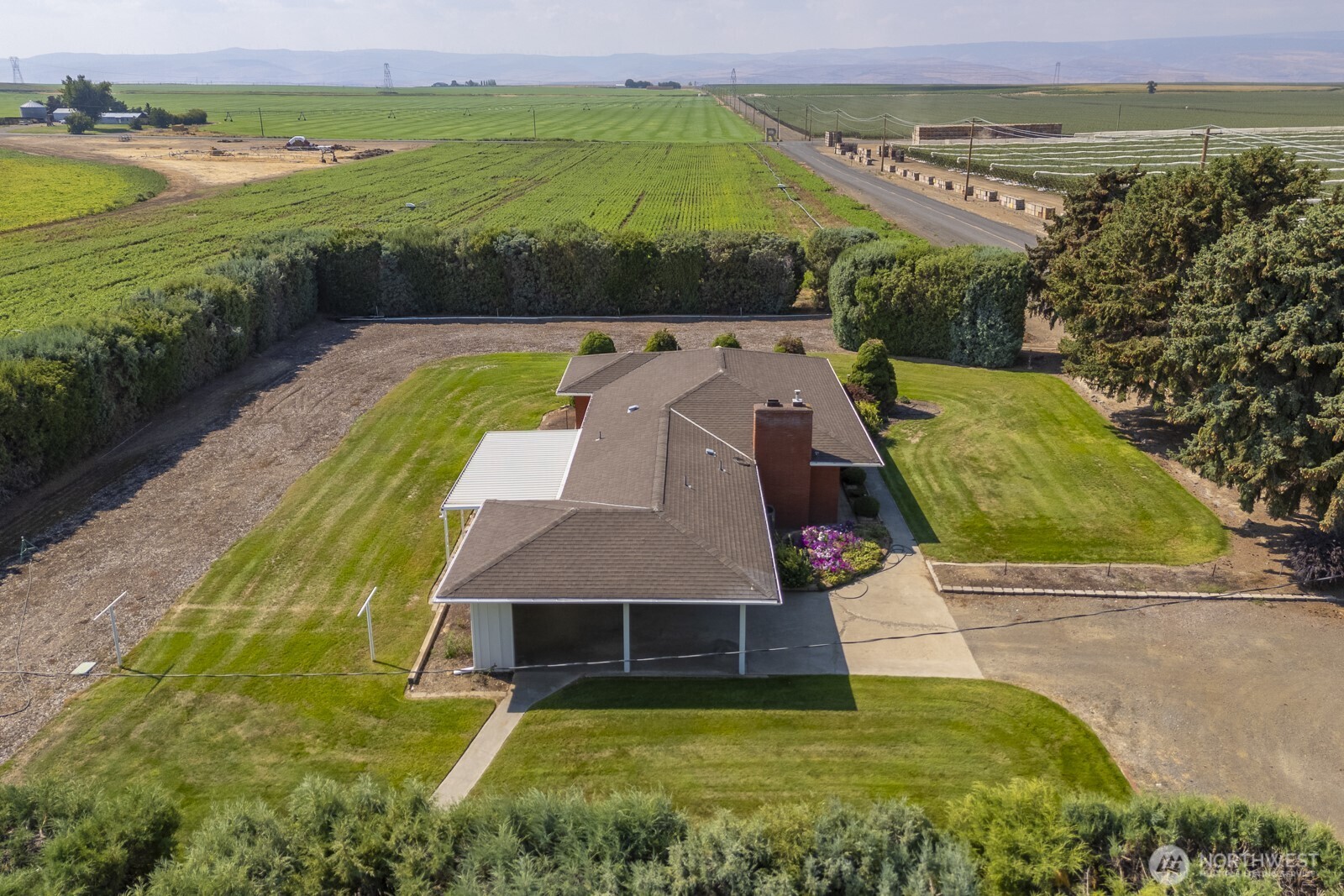 21807 Southwest 1st Road Quincy, WA 98848 - Photo 36 of 40 a view of a swimming pool with an outdoor space and seating area