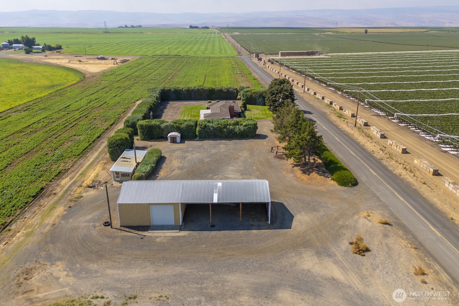 21807 Southwest 1st Road Quincy, WA 98848 - Photo 38 of 40 a view of a swimming pool with a yard