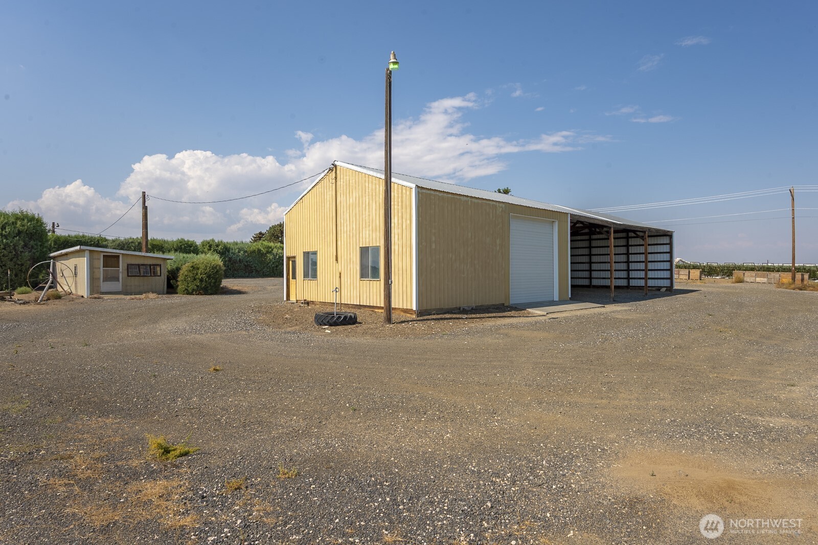 21807 Southwest 1st Road Quincy, WA 98848 - Photo 39 of 40 a view of a house with a backyard and road