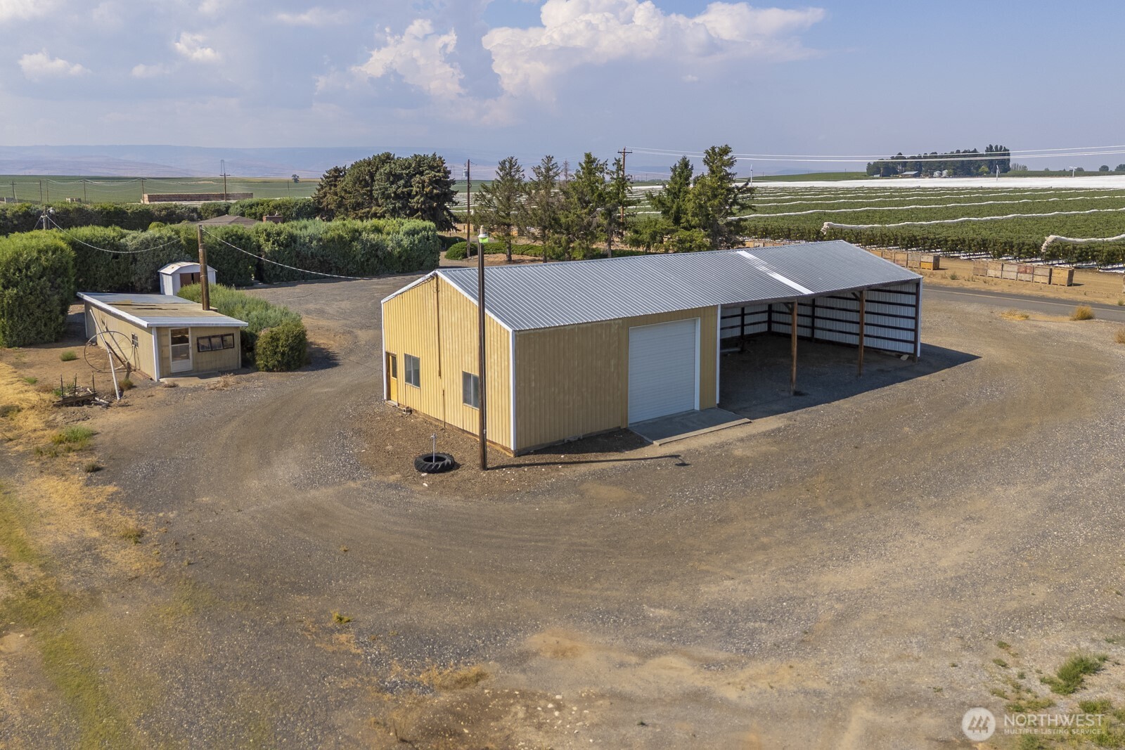 21807 Southwest 1st Road Quincy, WA 98848 - Photo 40 of 40 a view of a terrace with a bench and lake view