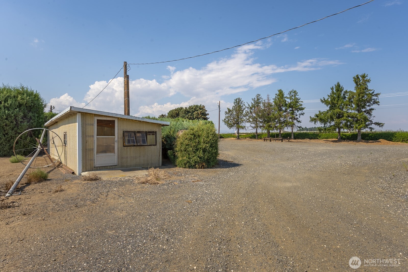 21807 Southwest 1st Road Quincy, WA 98848 - Photo 7 of 40 a front view of a house with a yard and garage