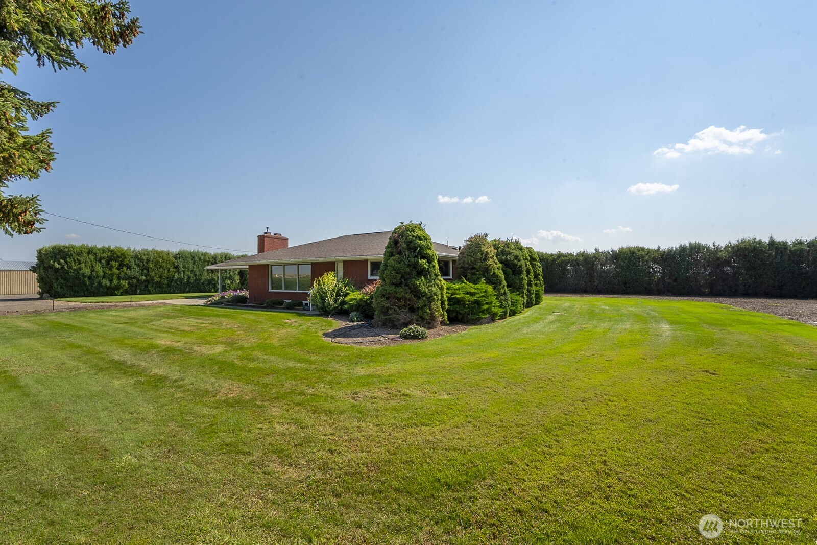 21807 Southwest 1st Road Quincy, WA 98848 - Photo 10 of 40 a view of a garden with a house