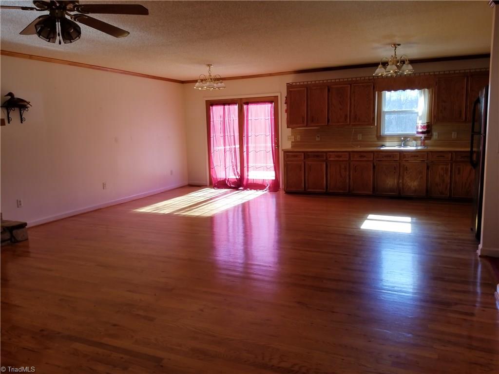 718 Wiley Royal Road Elkin, NC 28621 - Photo 14 of 27 Large open living room, kitchen and dining area. Perfect for entertaining!