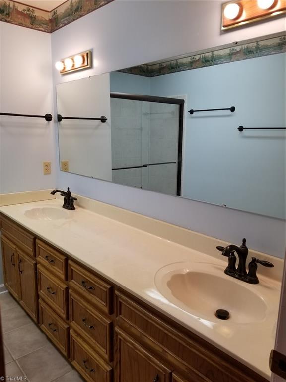 718 Wiley Royal Road Elkin, NC 28621 - Photo 17 of 27 Remodeled main bath with huge double sinks