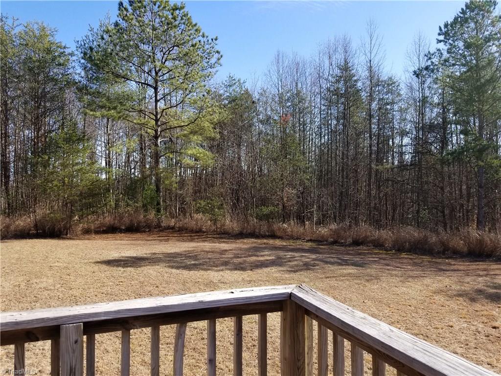 718 Wiley Royal Road Elkin, NC 28621 - Photo 25 of 27 View of the yard from the back deck.