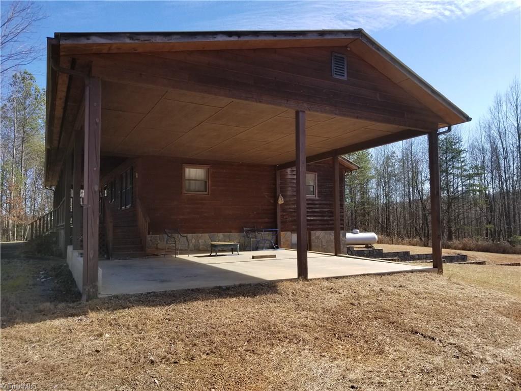 718 Wiley Royal Road Elkin, NC 28621 - Photo 5 of 27 Right side view of home with double carport