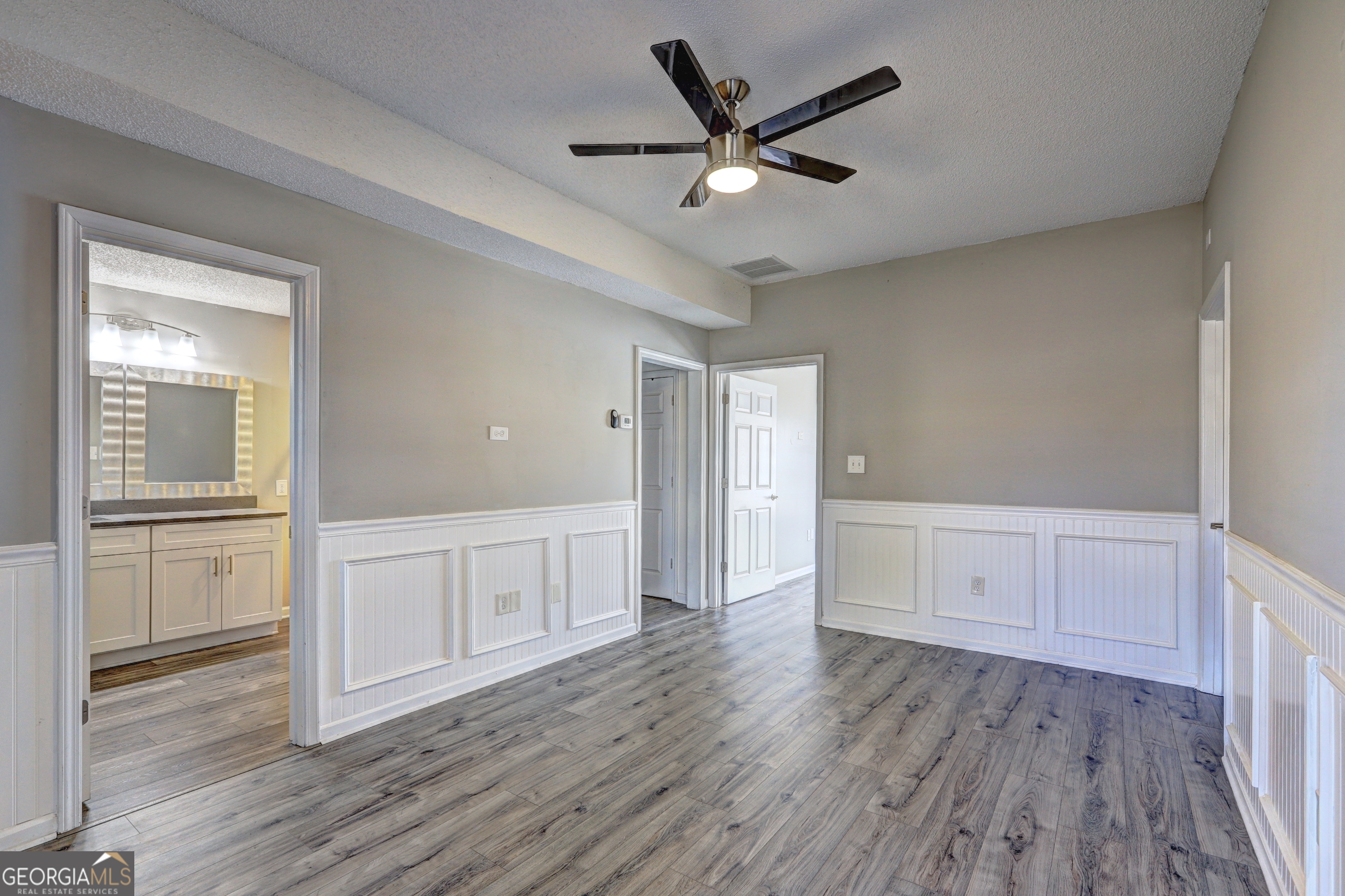 36 Snapfinger Trail Stockbridge, GA 30281 - Photo 12 of 17 wooden floor in an empty room with a window