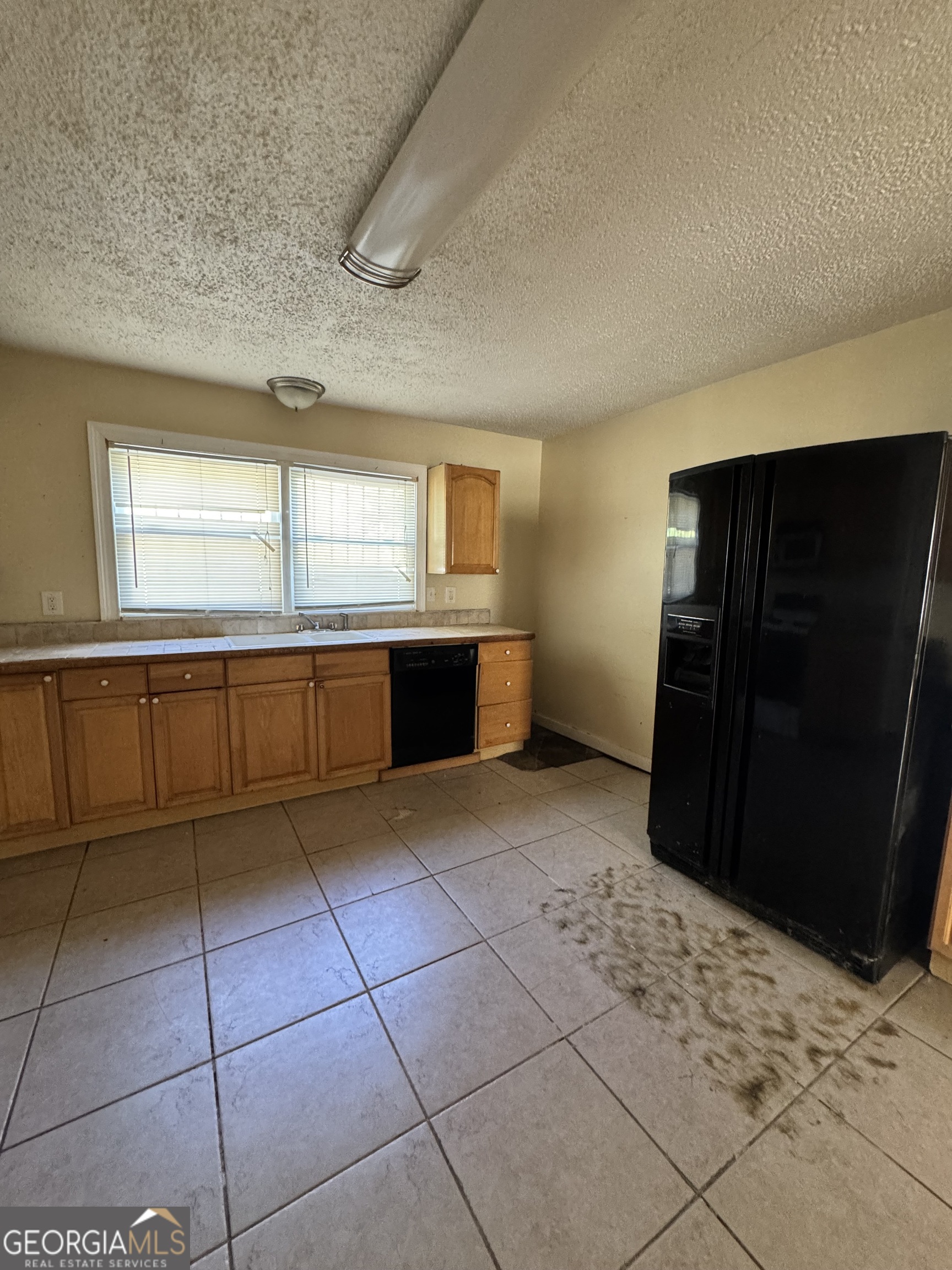 1179 Panola Road Stone Mountain, GA 30088 - Photo 6 of 15 a view of a utility room and window
