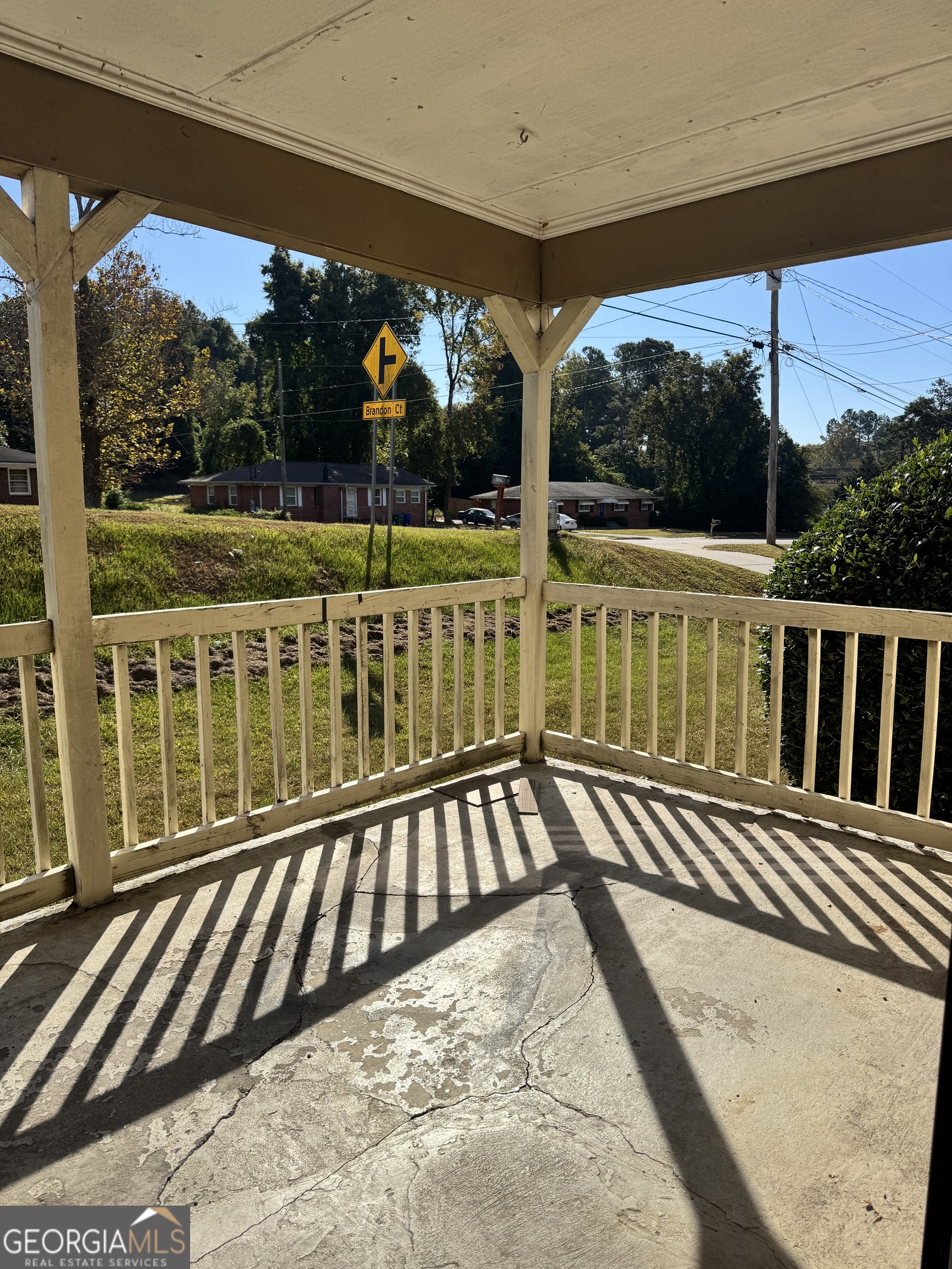 1179 Panola Road Stone Mountain, GA 30088 - Photo 10 of 15 a view of a balcony with wooden floor