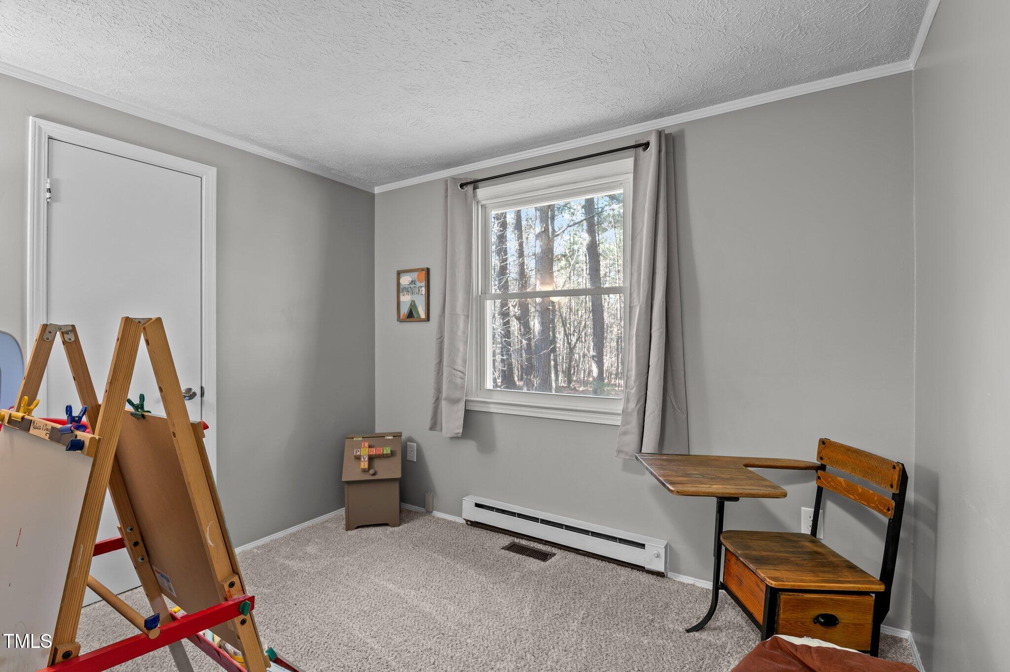 749 Fred Royster Road Henderson, NC 27537 - Photo 12 of 31 a view of a room with gym equipment
