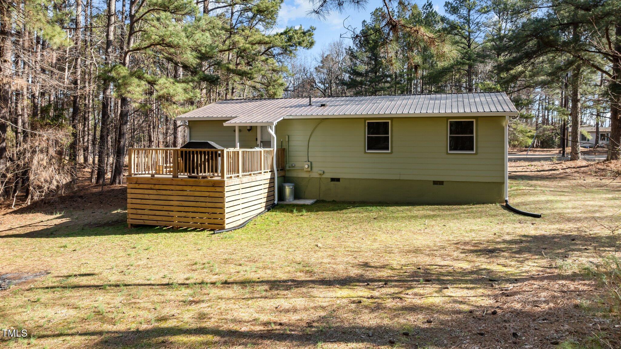 749 Fred Royster Road Henderson, NC 27537 - Photo 25 of 31 a view of a house with a yard