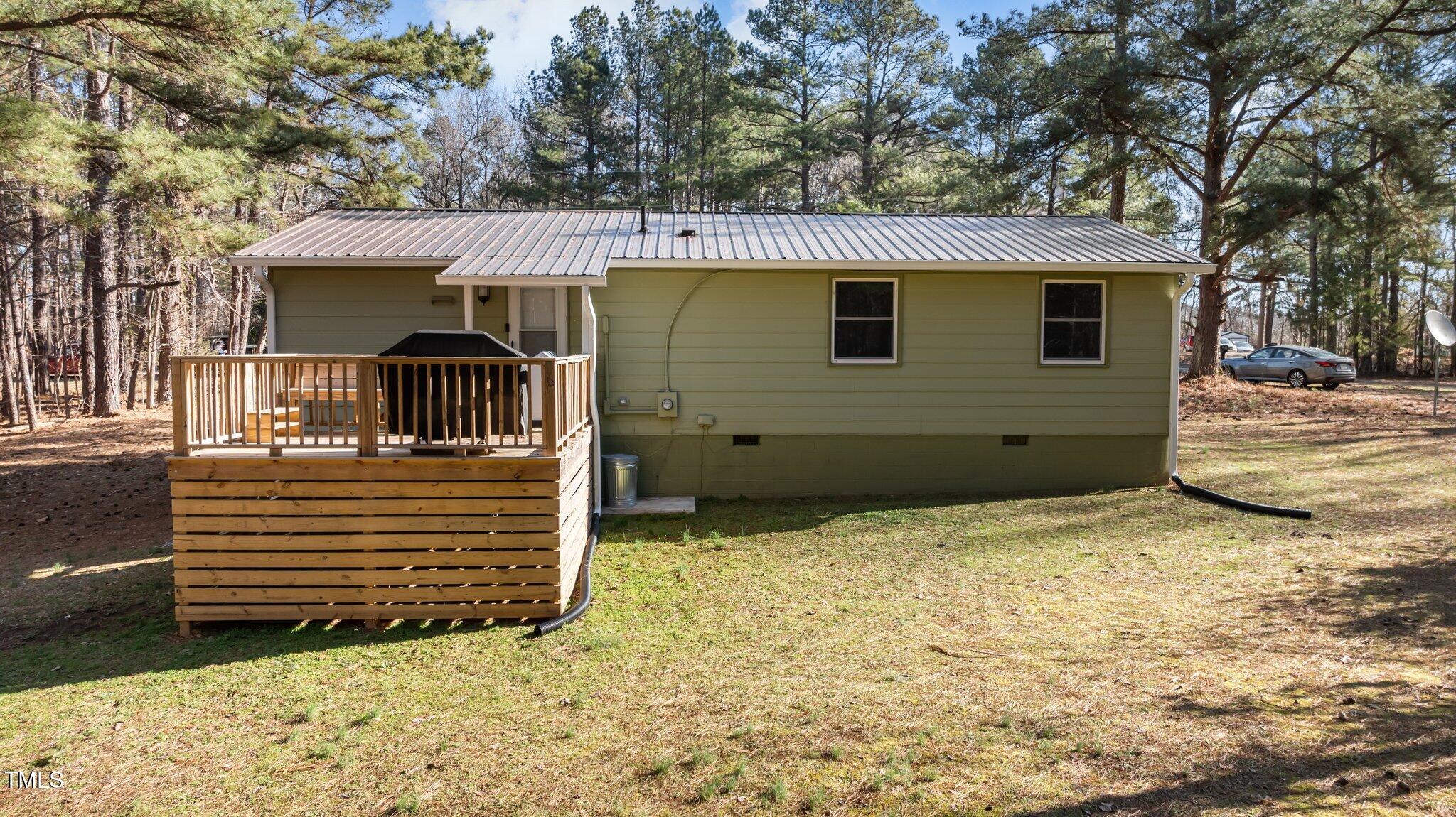 749 Fred Royster Road Henderson, NC 27537 - Photo 26 of 31 a view of a house with a yard
