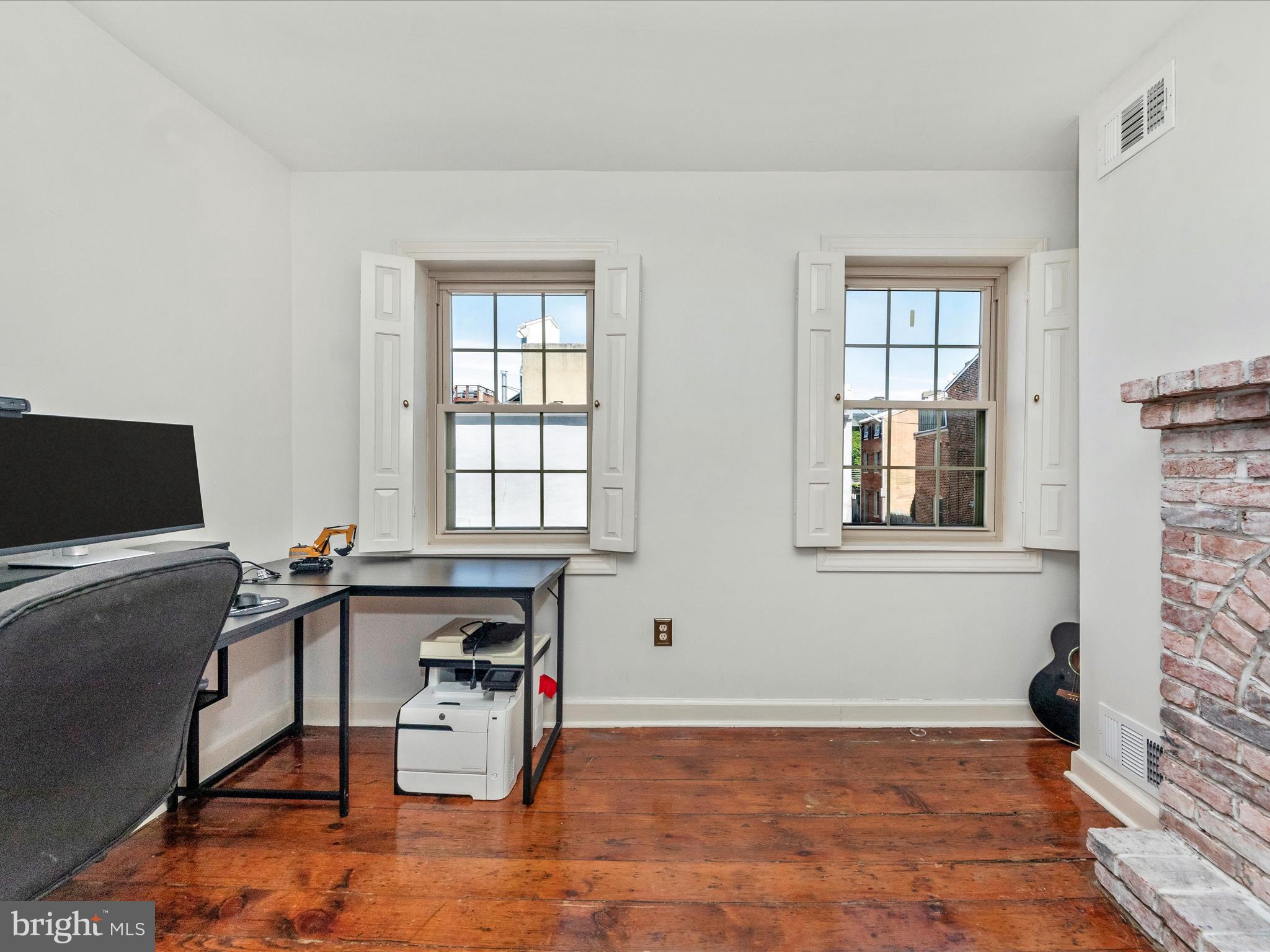 23 East Wheeling Street Baltimore, MD 21230 - Photo 31 of 51 a view of a workspace with furniture and a window