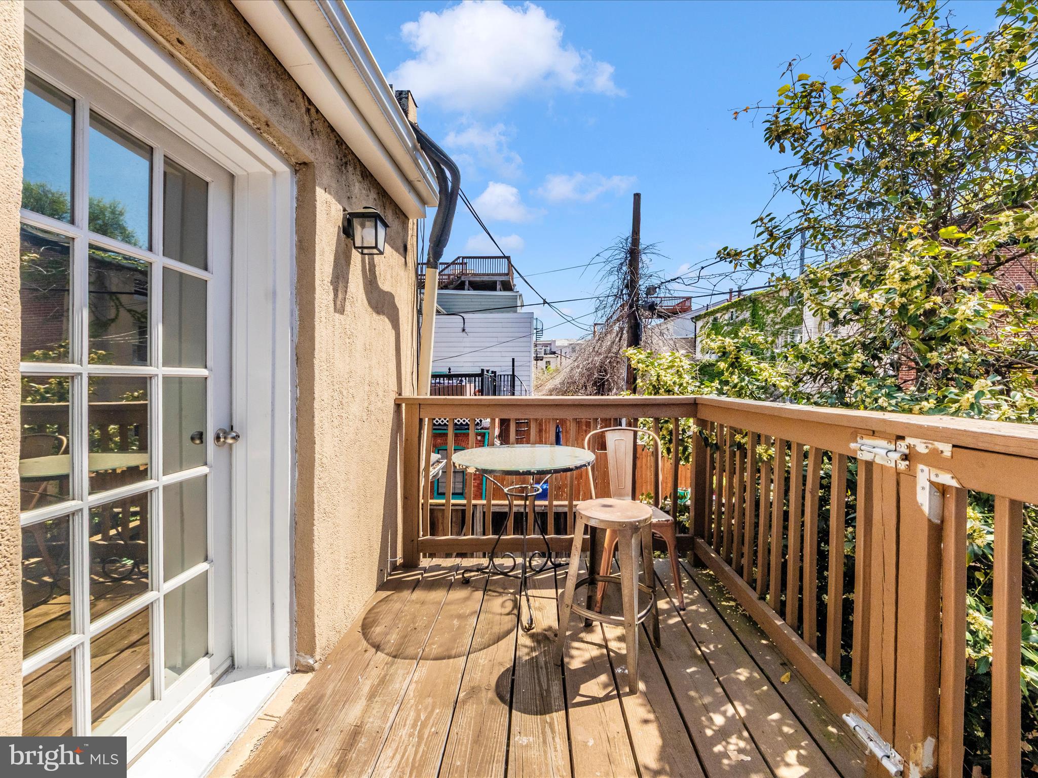23 East Wheeling Street Baltimore, MD 21230 - Photo 39 of 51 a balcony with wooden floor and city view