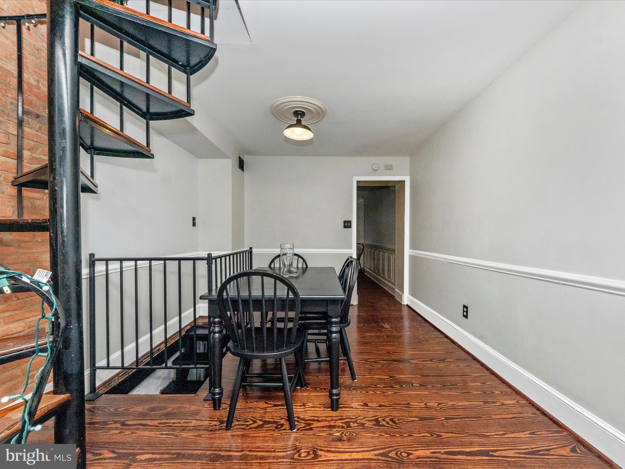 23 East Wheeling Street Baltimore, MD 21230 - Photo 8 of 51 a view of a dining room with furniture and wooden floor