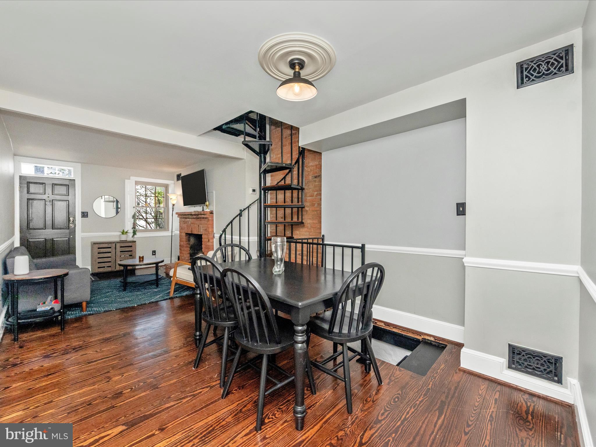 23 East Wheeling Street Baltimore, MD 21230 - Photo 10 of 51 a view of a dining room with furniture and wooden floor