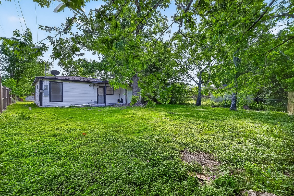 4933 Doolittle Boulevard Houston, TX 77033 - Photo 26 of 28 a view of a house with backyard and garden