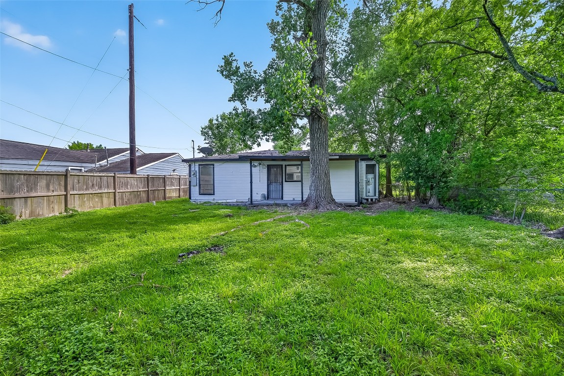 4933 Doolittle Boulevard Houston, TX 77033 - Photo 28 of 28 a view of a house with a backyard