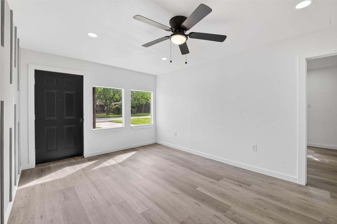 4933 Doolittle Boulevard Houston, TX 77033 - Photo 5 of 28 a view of an empty room with a window
