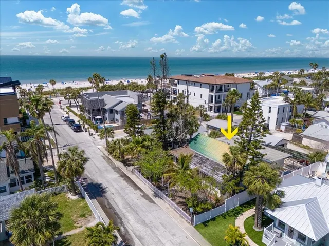 a view of a city with an ocean view