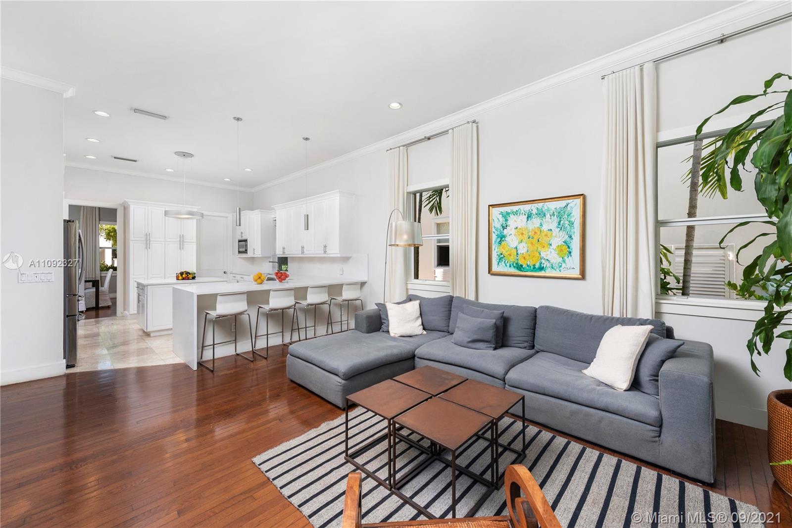 280 Ridgewood Road Key Biscayne, FL 33149 - Photo 12 of 30 a living room with furniture and a rug