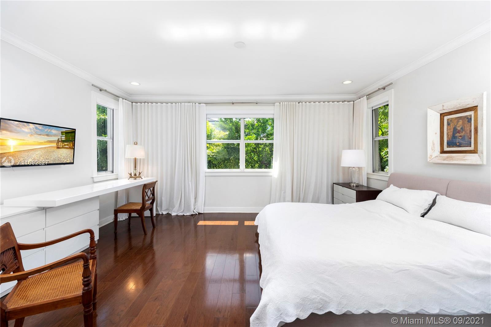 280 Ridgewood Road Key Biscayne, FL 33149 - Photo 17 of 30 a bedroom with a bed and a desk