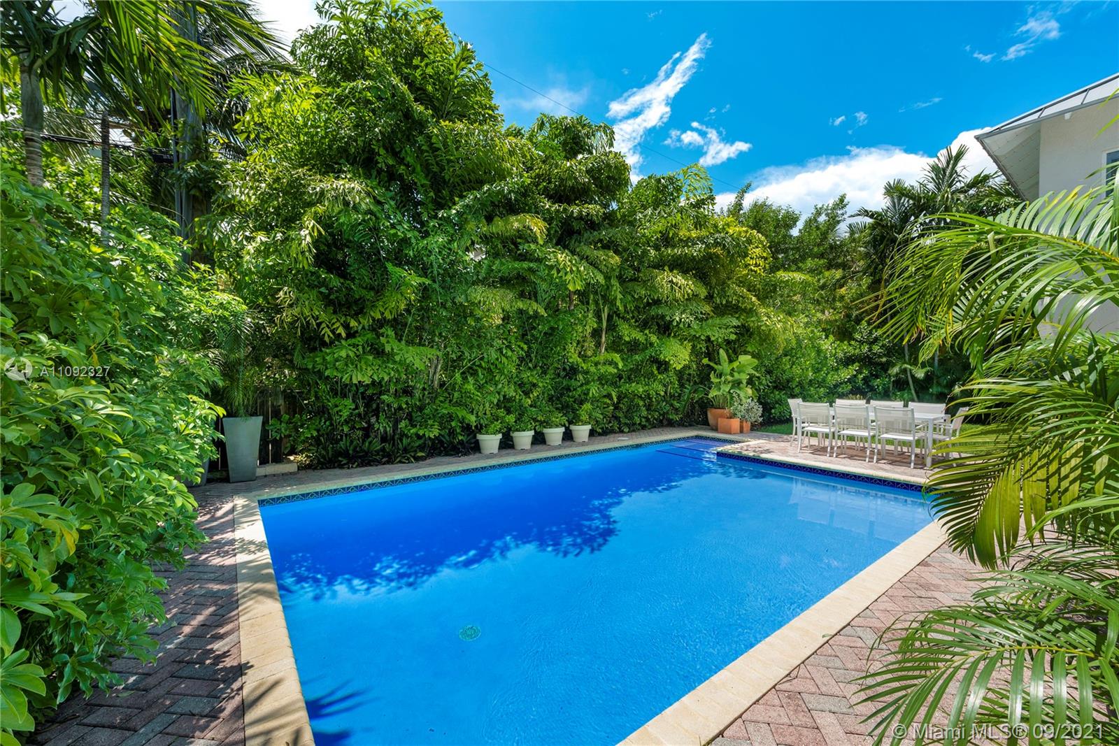 280 Ridgewood Road Key Biscayne, FL 33149 - Photo 29 of 30 a view of swimming pool from a balcony
