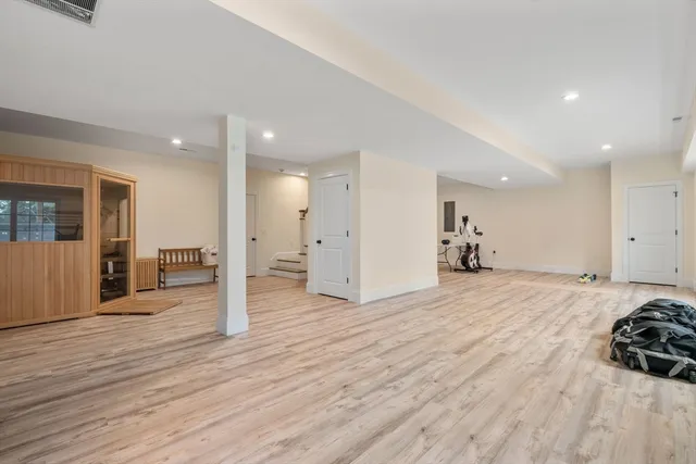 a view of a livingroom with wooden floor