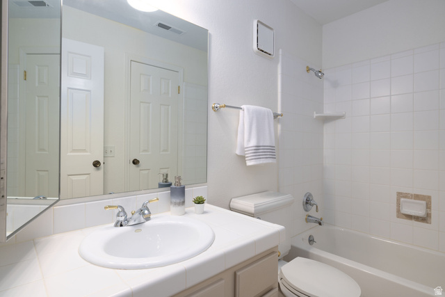 6936 South 775 East, Unit B Midvale, UT 84047 - Photo 20 of 33 Full bathroom with vanity and bathing tub / shower combination
