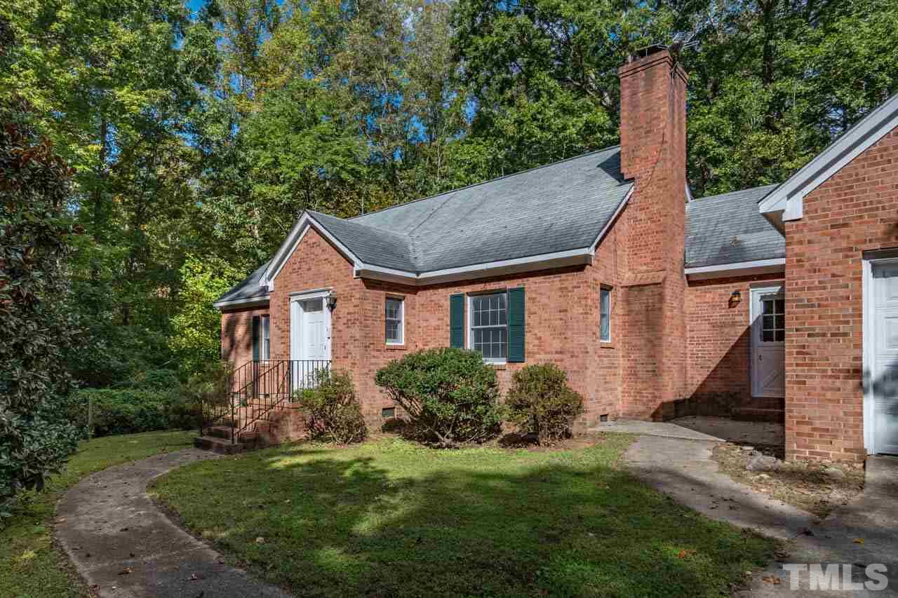3715 Bahama Road Rougemont, NC 27572 - Photo 2 of 30 a house with green field in front of it