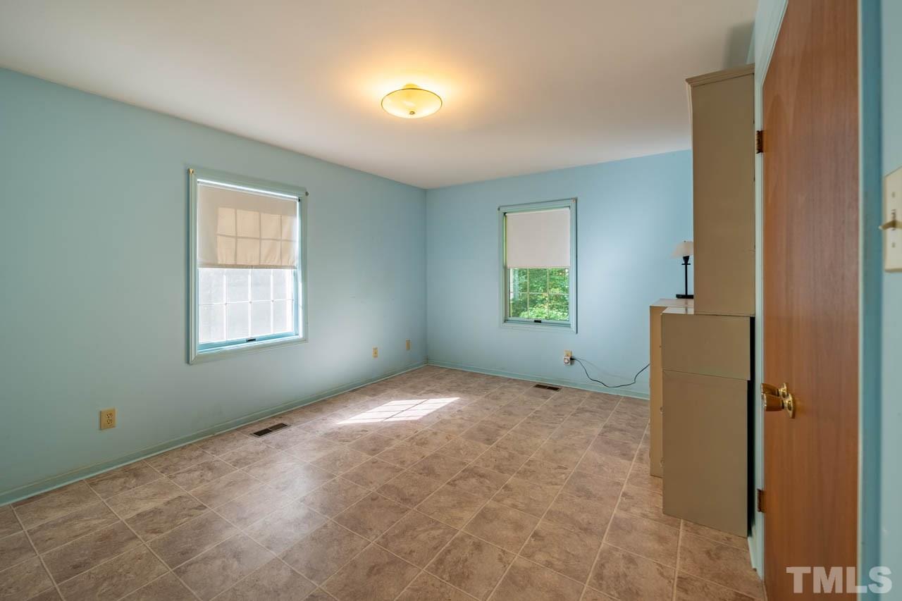3715 Bahama Road Rougemont, NC 27572 - Photo 17 of 30 an empty room with windows