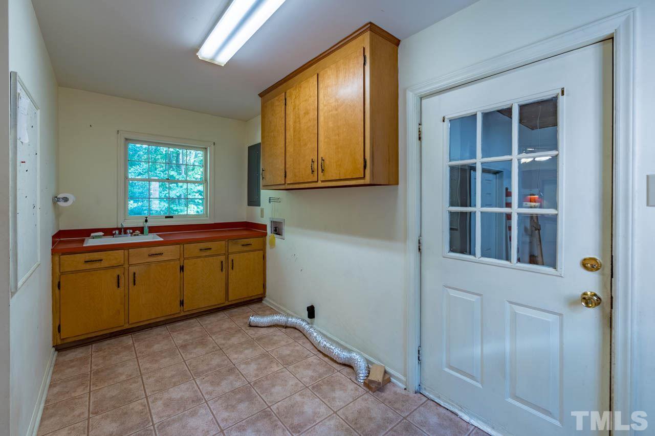 3715 Bahama Road Rougemont, NC 27572 - Photo 20 of 30 a room with cabinets and window