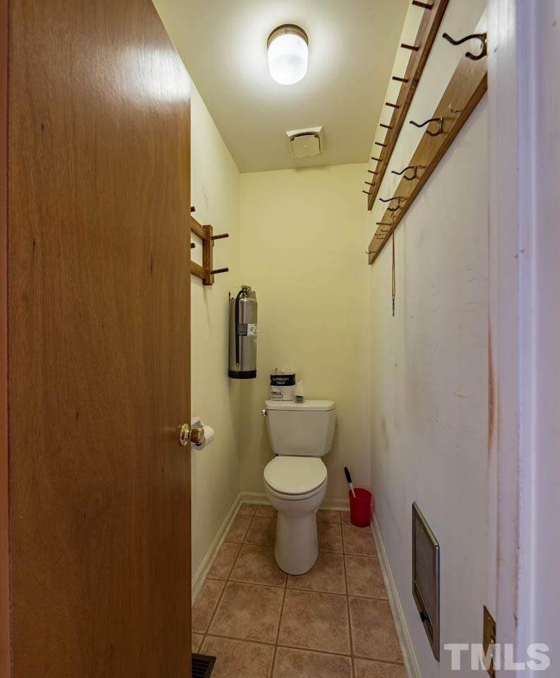 3715 Bahama Road Rougemont, NC 27572 - Photo 21 of 30 a bathroom with a toilet and a shower