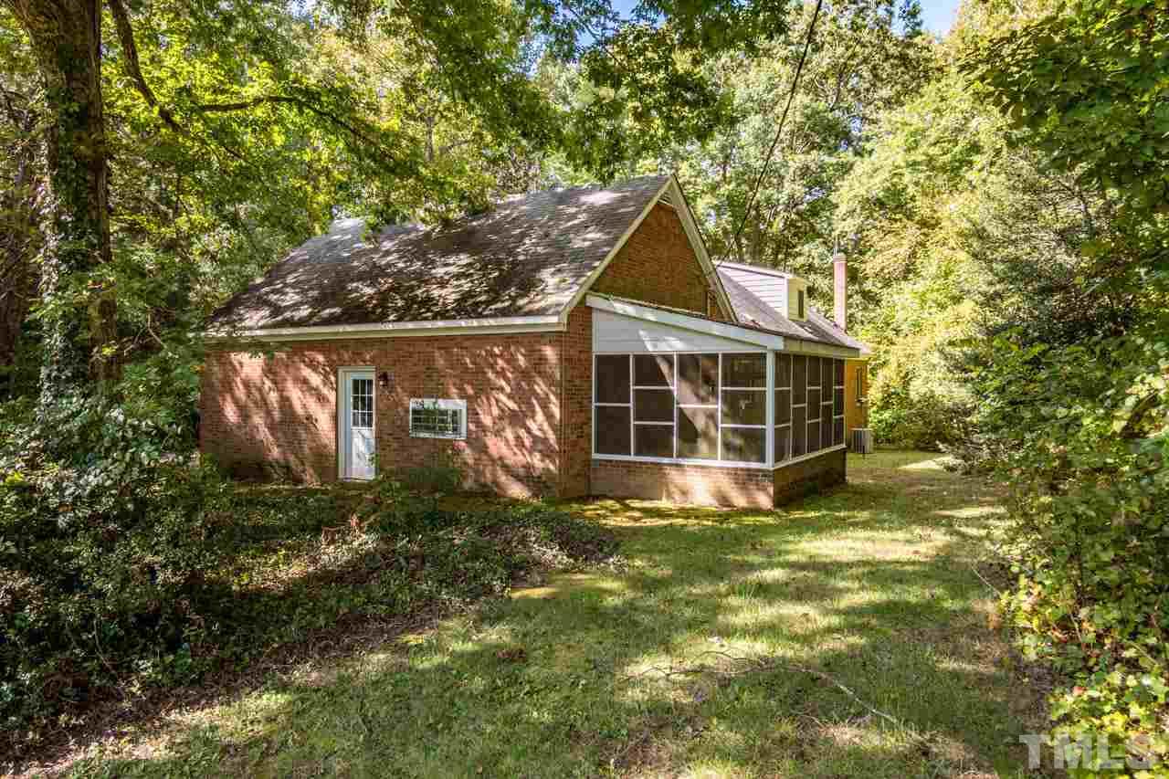 3715 Bahama Road Rougemont, NC 27572 - Photo 25 of 30 a view of a house with a yard