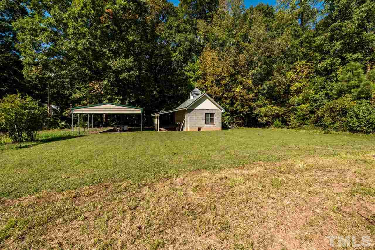 3715 Bahama Road Rougemont, NC 27572 - Photo 28 of 30 a view of house with garden