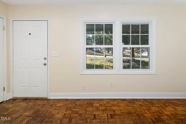 a view of an empty room with window